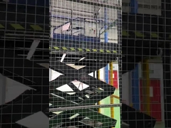 Instalación de mesa elevadora de tijera estacionaria en el almacén del cliente para carga y descarga