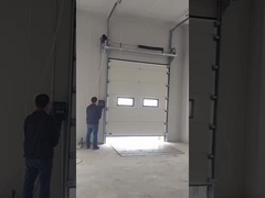 Nivelador de muelle y puerta seccional